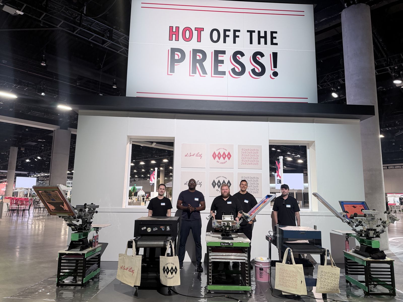 Merch Troop live screen-printing station running at a Detroit event